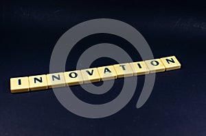 Innovation word concept black texture background image using by block letter for English language learning concept