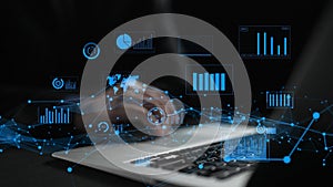 Innovative Technology Concept with Data Analysis and Visualization on Laptop, Person Working with Digital Charts and