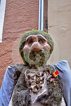 Innsbruck, Austria - Dec, 2023: Statue of troll in Innsbruck during the Christmas market.