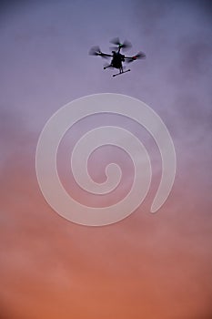 inovation drone with automated external defibrilator aed flying in sunset photo
