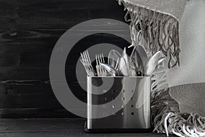Inox cutlery. Spoon and fork. Stainless steel. Monocrome style photo