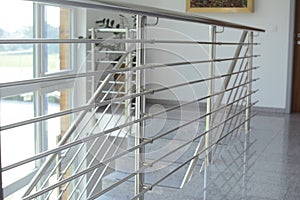 Inox stainless steel indoor fence in the staircase