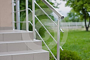 Inox steel fence with stairways photo