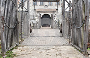 Input and suspension bridge in old castle