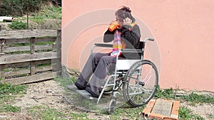 Insane woman on wheelchair
