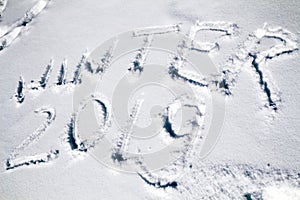 Inscription 2019 on the snow, simbol of new year 2019