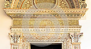 Inscription in Arabic script in the frieze. Portal of Iron Doors