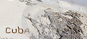 Inscription on the beach sand .Cuba.