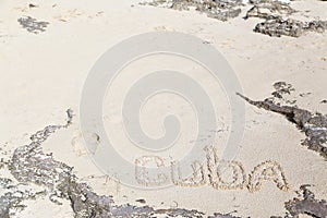 Inscription on the beach sand .Cuba.