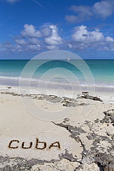 Inscription on the beach sand .Cuba.