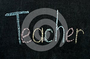 Inscription in chalk on a blackboard - teacher