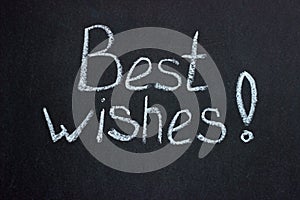 The inscription on the chalkboard `Best wishes`