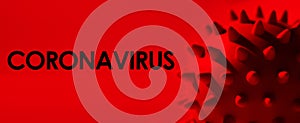 Inscription CORONAVIRUS on red background. World Health Organization WHO introduced new official name for chinese virus 2020.