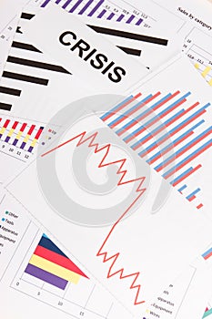 Inscription crisis and downward graphs representing financial crisis caused by coronavirus. Covid-19