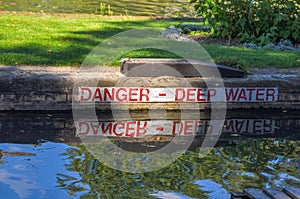 The inscription `Danger - deep water`