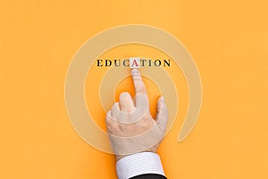 The inscription Education on an orange background
