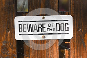 Inscription on the fence: Beware of the dog