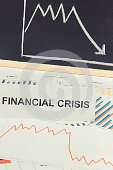 Inscription financial crisis and downward graphs representing financial crash caused by coronavirus. Covid-19