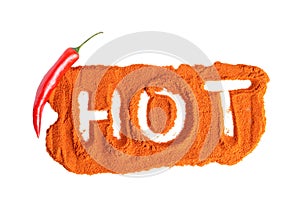 Inscription HOT made of cayenne chilli pepper isolated on white