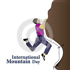 Inscription International Mountains Day with the image of climbers