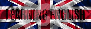Inscription - Learning English against the background of the flag of the United Kingdom