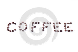 Inscription made of coffee beans, coffee word. Coffee lettering.