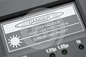 Inscription when measuring optical fiber danger laser radiation do not look inside the beam
