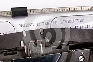 The inscription & x22;nobel prize in literature& x22; on a white sheet in a typewriter. Nobel prize in literature