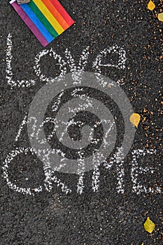 inscription on the pavement love is not a crime