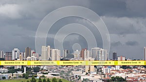 Quarantine Covid - 19 inscription in yellow and black in a city in the interior of Sao Paulo, Brazil, South America