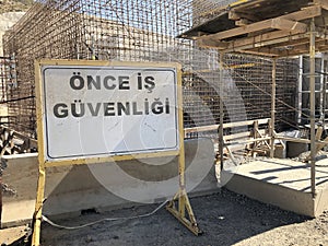 Inscription safety first on turkish at construction site
