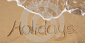 The inscription on the sand - holidays