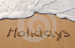 The inscription on the sand - holidays photo