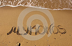 The inscription on the sand near the sea - Mykonos