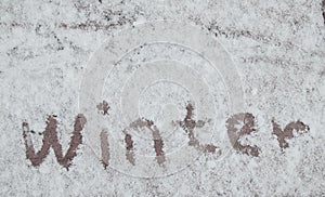 Inscription on snow, winter interesting background.