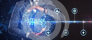 Inscription SOFTWARE TESTING on the virtual display. Business, modern technology, internet and networking concept