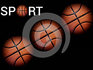 The inscription sport on a black background with basketballs