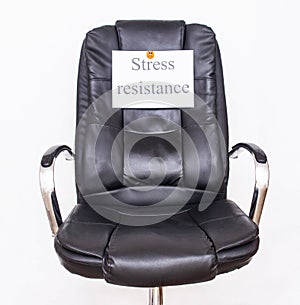 The inscription stress resistance on an office chair. Workplace stress tolerance concept