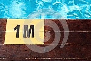 Inscription of the swimming pool depth of 1 meter