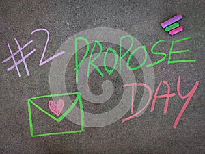 The inscription text on the grey board, #1 Propose day