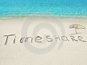 Inscription Timeshare in the sand on a tropical island, Maldives.
