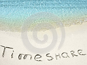 Inscription Timeshare in the sand on a tropical island, Maldives.