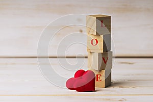 Inscription from wooden cubes Love .   concept of romance love