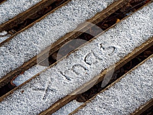 The inscription xmas on the snow.