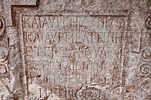 Inscriptions in ancient Greek on ruined tombstone in a cemetery in Turkish Anatolia