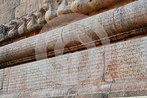 Inscriptions of Tamil language carved on the stone walls at Brihadeeswarar temple in Thanjavur, Tamilnadu, India.