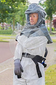 Insect fighter wears airtight work suit