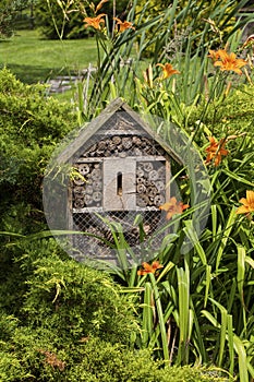 Insect house - hotel in a summer garden