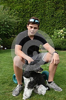 Inseparable friends, a boy and his dog photo