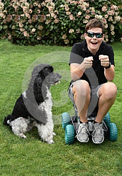 Inseparable friends, a boy and his dog photo